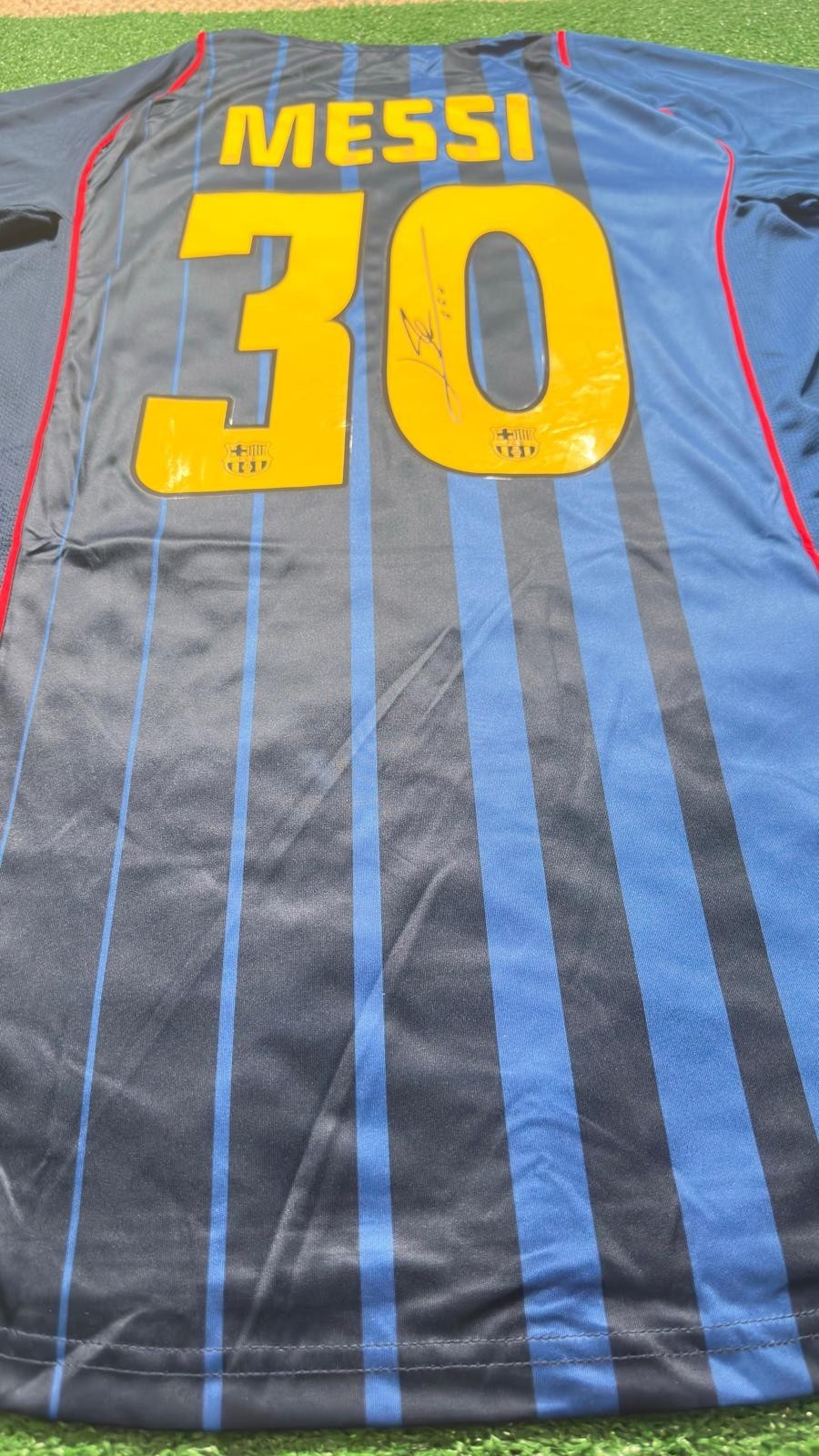 Lionel Messi signed FC Barcelona away jersey detail view 13